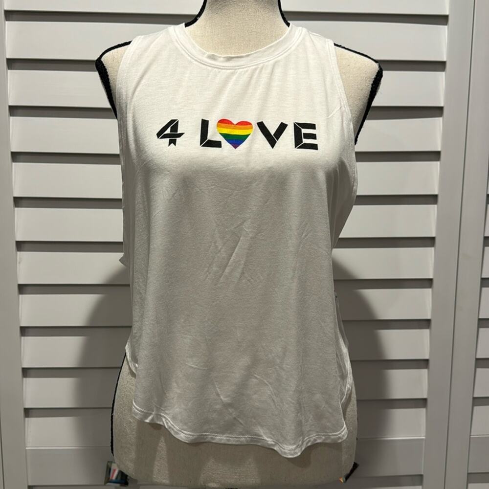 Fourlaps NWT Curve Tank in a Micro Modal/Nylon/Spandex Blend.